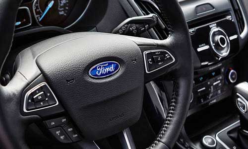 Woman turning AC Knob